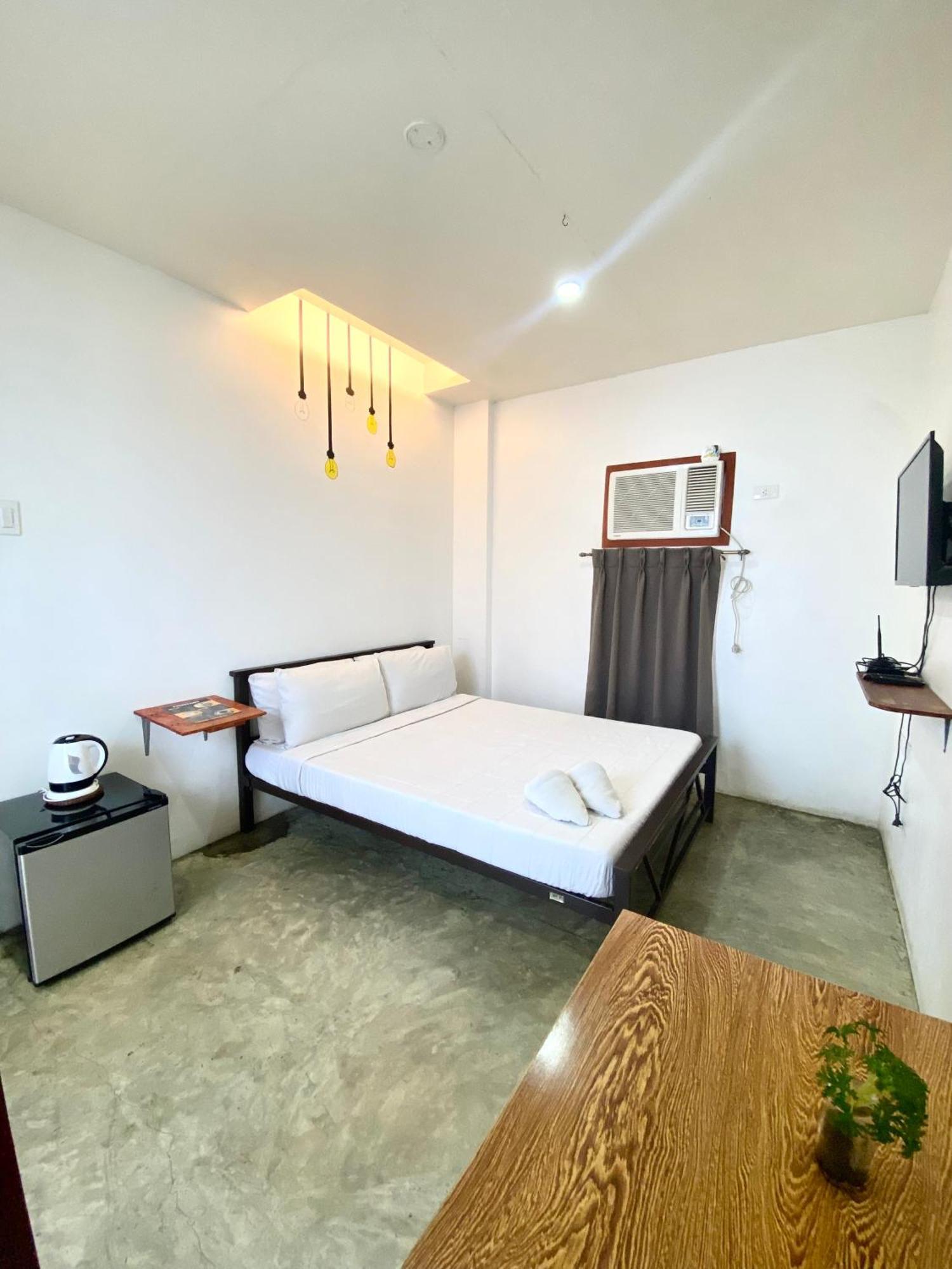 Oyo495口袋酒店 麦克坦 外观 照片